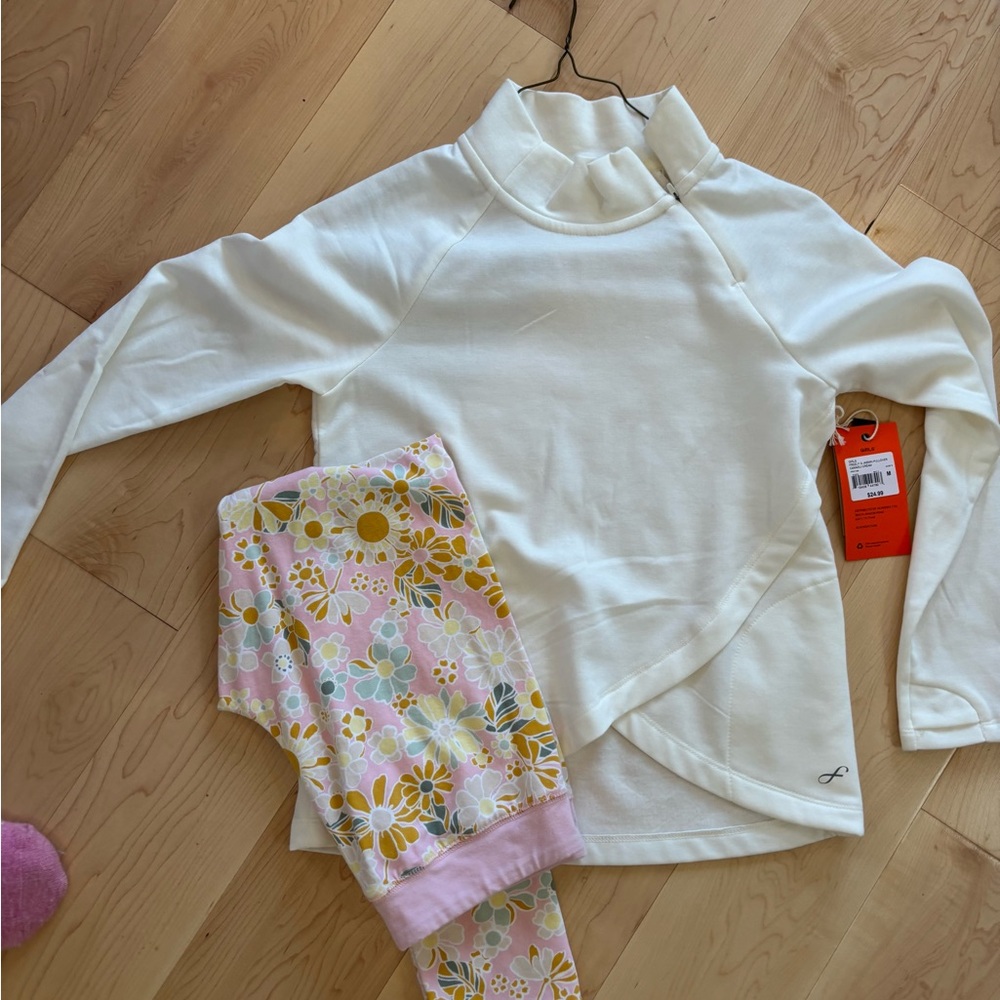 Freely cream shirt and leggingss. Girls sizes 10